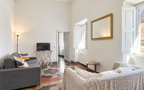 Appartamento Chiavari, Roma: Flooring, Interior Design, Floor, Wall, Furniture, Wood, Ceiling, Couch, Living Room, Room