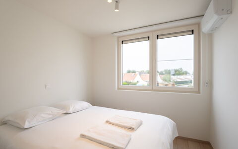 De Strandloper i with Parking & Airco: Furniture, Interior Design, Flooring, Ceiling, Floor, Chair, Room, Lighting, Table, Kitchen & Dining Room Table
