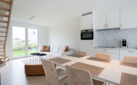 De Strandloper i with Parking & Airco: Furniture, Interior Design, Flooring, Ceiling, Floor, Chair, Room, Lighting, Table, Kitchen & Dining Room Table