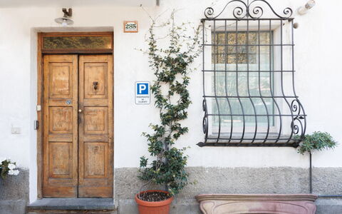 Lagomonti Apartments: Flooring, Bedroom, Bedding, Bed, Bed Frame, Linens, Bed Sheet, Hardwood, Mattress, Wood Flooring