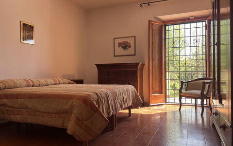 Villa Il Parco: Furniture, Interior Design, Wood, Flooring, Floor, Room, Ceiling, Bed, Lighting, Bedroom