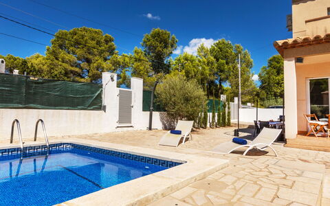 Villa Danou: Flooring, Bedroom, Bedding, Bed, Bed Frame, Linens, Bed Sheet, Hardwood, Mattress, Wood Flooring