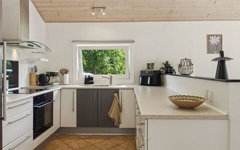Elle: Countertop, Kitchen, Furniture, Interior Design, Flooring, Kitchen Appliance, Cabinetry, Wood, Ceiling, Floor