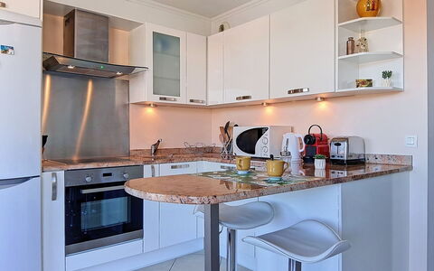 Le Royal Cap: Furniture, Countertop, Kitchen, Kitchen Appliance, Cabinetry, Interior Design, Major Appliance, Flooring, Wood, Home Appliance