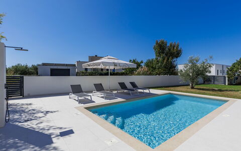 Level 4: Swimming Pool, Composite Material, Shade, Concrete, Tile, Resort, Landscaping, Design, Outdoor Furniture, Water Feature
