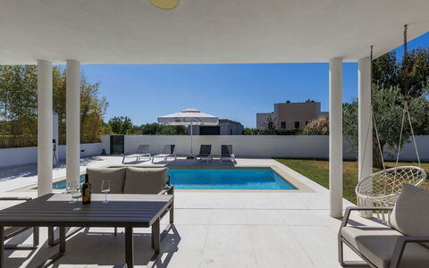 Level 4: Furniture, Flooring, Outdoor Furniture, Floor, Chair, Swimming Pool, Composite Material, Shade, Resort, Patio