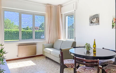 Carla: Furniture, Interior Design, Flooring, Floor, Ceiling, Room, Couch, Table, Lighting, Living Room