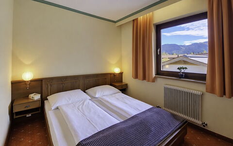 Sankt Ulrich am Pillersee 648: Interior Design, Ceiling, Room, Bed Frame, Hotel, Wood Stain, Picture Frame, Bedroom, Suite, Hardwood