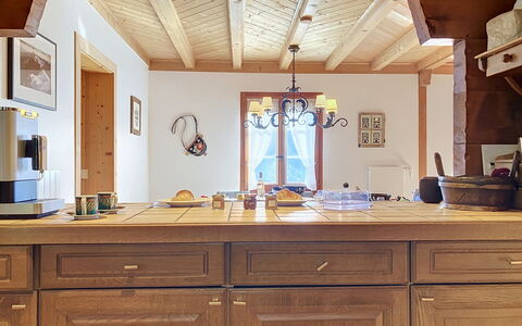 Chalet Perry: Furniture, Countertop, Wood, Flooring, Cabinetry, Interior Design, Kitchen, Ceiling, Floor, Light Fixture