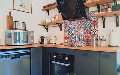 Pignots: Kitchen, Kitchen Appliance, Interior Design, Furniture, Countertop, Major Appliance, Wood, Cabinetry, Flooring, Room