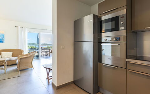 Cala Rossa: Furniture, Flooring, Interior Design, Kitchen, Countertop, Floor, Cabinetry, Ceiling, Kitchen Appliance, Major Appliance