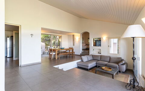 Cala Rossa: Flooring, Floor, Interior Design, Ceiling, Furniture, Couch, Room, Wood Flooring, Living Room, Lighting