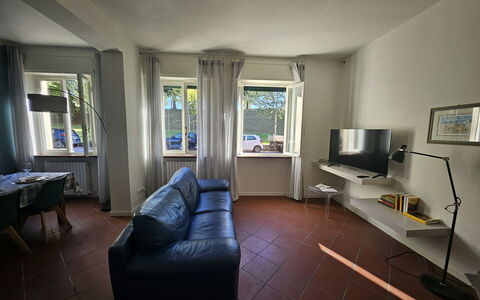 Adele: Flooring, Interior Design, Floor, Furniture, Ceiling, Room, Lighting, Apartment, Wood Flooring, Living Room