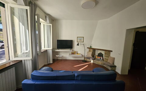 Adele: Furniture, Interior Design, Flooring, Floor, Wood, Ceiling, Room, Lighting, Living Room, Couch