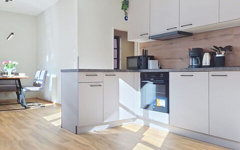 Radstadt 26: Flooring, Interior Design, Kitchen Appliance, Furniture, Floor, Countertop, Kitchen, Cabinetry, Wood, Major Appliance