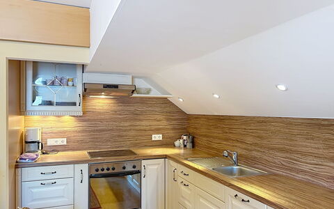 Wohlfühlnest St. Michael: Wood, Countertop, Kitchen, Interior Design, Flooring, Home, Floor, Ceiling, Lighting, Plumbing Fixture