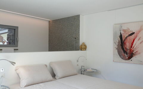 Valserhaus: Interior Design, Furniture, Bed, Wall, Bedroom, Ceiling, Light Fixture, Flooring, Floor, Room