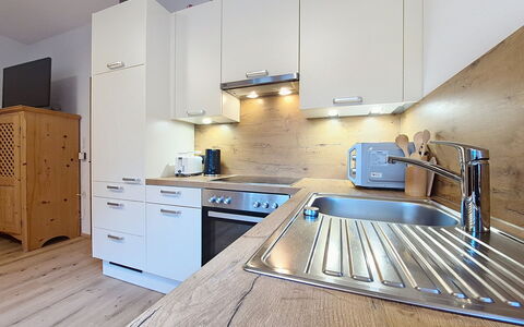 Oberladstätter: Kitchen, Countertop, Kitchen Appliance, Furniture, Flooring, Interior Design, Wood, Cabinetry, Major Appliance, Floor