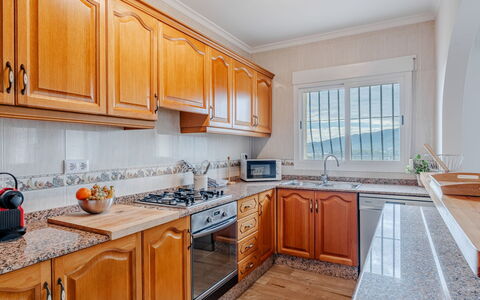 Vista Xalo: Kitchen, Countertop, Cabinetry, Wood, Flooring, Major Appliance, Kitchen Appliance, Interior Design, Home, Floor