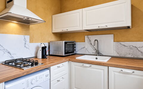 Zuccheri Canditi: Kitchen, Countertop, Kitchen Appliance, Major Appliance, Cabinetry, Flooring, Wood, Interior Design, Home, Furniture