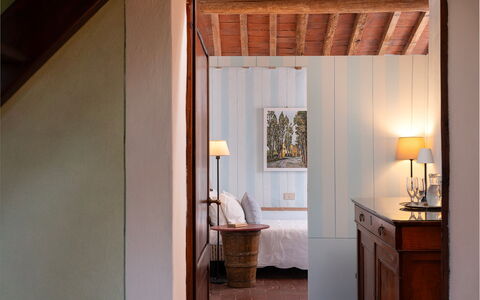 Villa Poggio Bellavista 8: Wall, Interior Design, Furniture, Wood, Bed, Bedroom, Flooring, Floor, Lighting, Ceiling