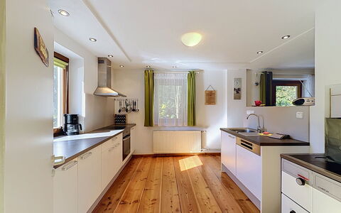 Ferienhaus Huber: Interior Design, Flooring, Kitchen, Wood, Countertop, Floor, Ceiling, Light Fixture, Furniture, Wood Flooring
