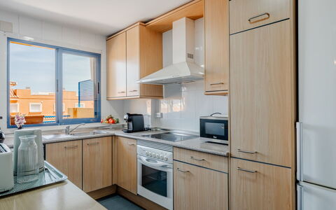 Puerta del Tenis: Kitchen, Countertop, Kitchen Appliance, Major Appliance, Cabinetry, Kitchen Sink, Kitchen Stove, Interior Design, Apartment, Stove