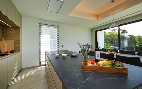 Abnorma: Interior Design, Flooring, Furniture, Countertop, Floor, Kitchen, Kitchen & Dining Room Table, Cabinetry, Ceiling, Glass