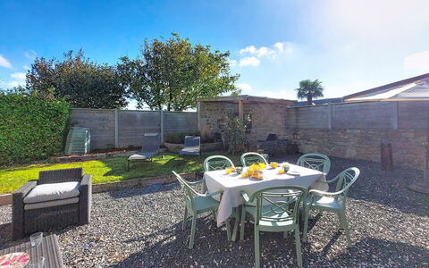 Au Coin des 3 Feux: Furniture, Outdoor Furniture, Chair, Home, Land Lot, Outdoor Table, Flagstone, Garden, Shade, Flowerpot