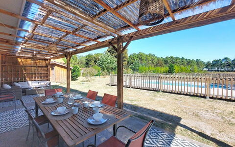 Tartoure: Shade, Resort, Deck, Chair, Porch, Eco Hotel, Hardwood, Wood Stain, Outdoor Structure, Design