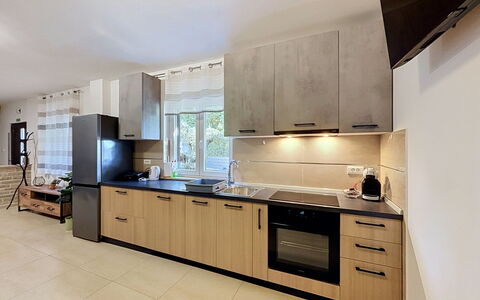 Martina: Kitchen, Kitchen Appliance, Countertop, Furniture, Major Appliance, Interior Design, Cabinetry, Flooring, Wood, Floor