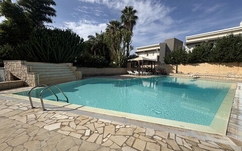Villa le Palme, Marina di Ragusa: Swimming Pool, Resort, Residential Area, Composite Material, Water Feature, Shade, Estate, Eco Hotel, Hotel