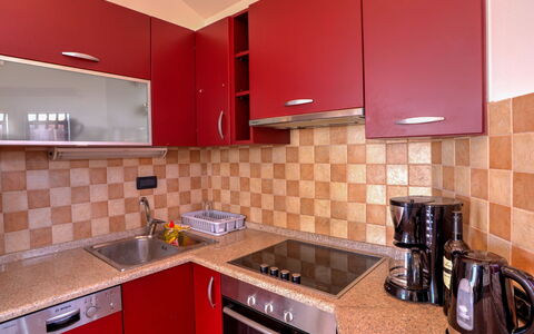 Lovran 135: Kitchen Appliance, Kitchen, Countertop, Major Appliance, Kitchen Stove, Cabinetry, Stove, Wood, Interior Design, Flooring