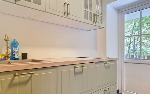 Haus Enzian: Flooring, Wood, Interior Design, Cabinetry, Floor, Cupboard, Wood Stain, Kitchen, Ceiling, Countertop