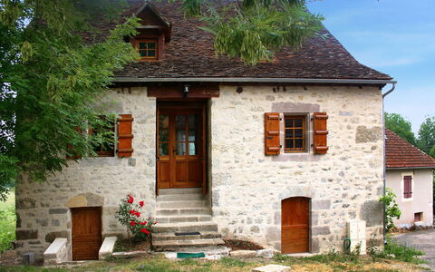 Maison Bonneval: Plant, Building, Window, Sky, Tree, House, Door, Land Lot, Wood, Biome
