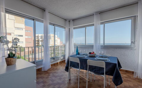 Les Cyclades: Table, Furniture, Property, Plant, Building, Window, Houseplant, Flowerpot, Wood, Chair