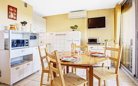Canet-Plage 200: Furniture, Table, Cabinetry, Wood, Chair, Countertop, Shelf, Flooring, Floor, Kitchen