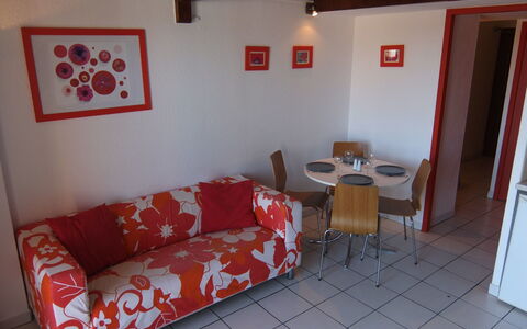 Le Central Beach: Room, Property, Red, Furniture, Interior Design, Building, Living Room, House, Real Estate, Floor