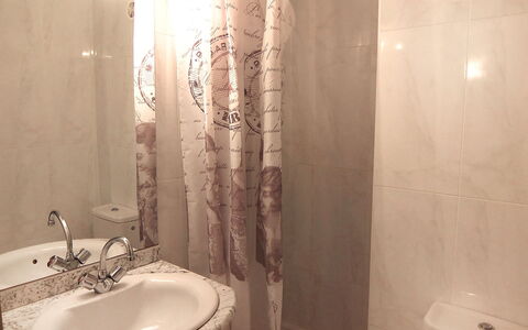 Le Central Beach: Bathroom, Shower Curtain, Property, Room, Wall, Plumbing Fixture, Bathroom Accessory, Curtain, Interior Design, Toilet