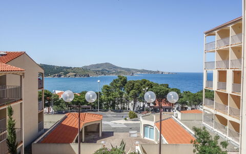 Thalacap: Sky, Water, Building, Plant, Window, Azure, Shade, Tree, Urban Design, Seaside Resort