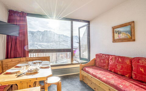 Val Thorens 650: Table, Furniture, Couch, Property, Building, Comfort, Picture Frame, Wood, Curtain, Textile