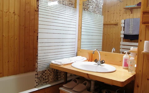Chamonix 210: Room, Property, Interior Design, Building, Bathroom, Wood, Sink, Furniture, Log Cabin, House