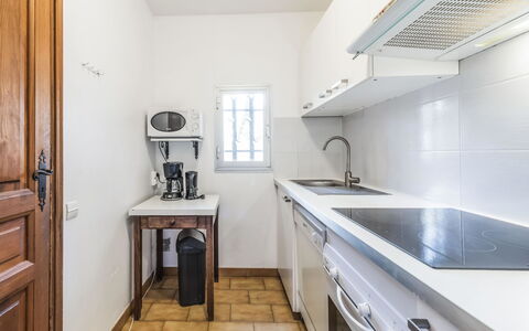 Cavalaire 370: Cabinetry, Countertop, Kitchen Sink, Furniture, Sink, Kitchen, Tap, Wood, Plumbing Fixture, Flooring