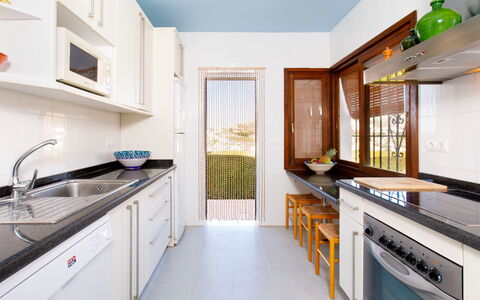 Villa Tulipán: Property, Room, Countertop, Kitchen, Cabinetry, Furniture, Building, Interior Design, House, Real Estate