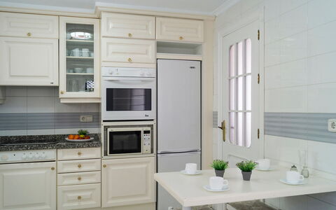 Mijas Beach: Countertop, Cabinetry, Room, Kitchen, Furniture, Property, Interior Design, Floor, Building, Tile