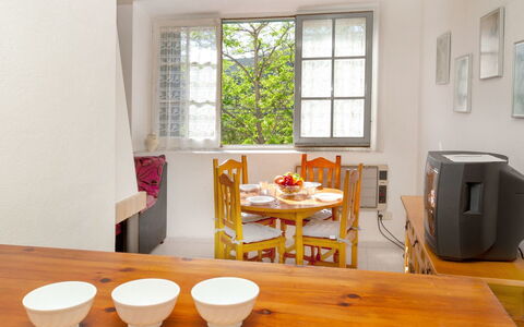 La Rectoria: Furniture, Table, Property, Window, Chair, Wood, Interior Design, Dishware, Building, Picture Frame