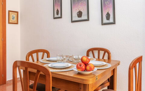 Edificio Garcomar i: Furniture, Interior Design, Wood, Flooring, Table, Room, Lighting, Dining Room, Floor, Home