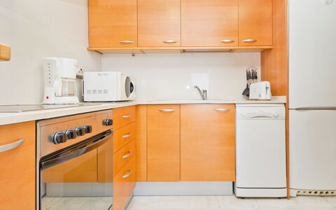 Edificio Nautic: Orange, Cabinetry, Kitchen, Room, Furniture, Property, Countertop, Major Appliance, Interior Design, Cupboard