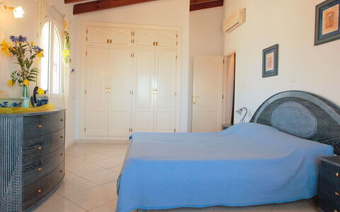 Villa Ma-Nita: Bedroom, Room, Furniture, Property, Bed, Bed Sheet, Blue, Bedding, Mattress, Building