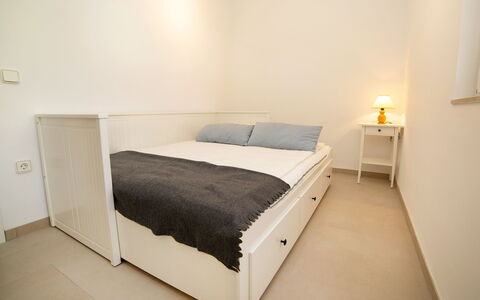 Jara: Bedroom, Bed, Furniture, Room, Property, Floor, Bed Frame, Bed Sheet, Wall, Interior Design